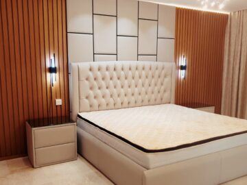 Luxury Dual-Texture Bedroom Feature Wall with Fluted Wood and Upholstered Geometric Paneling